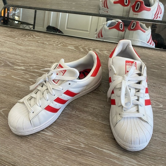 white and red shell toes